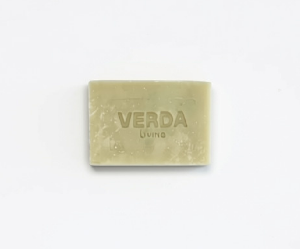 A rectangular bar of VERDA Living soap in a pale green color, centered on a plain white background.